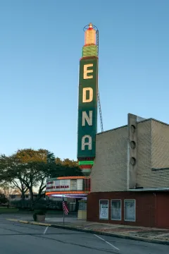 The Edna Theatre and its tall sign in downtown Edna, Texas.