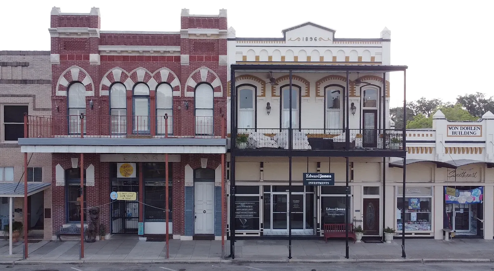Historic storefronts on the town square in Goliad, Texas.