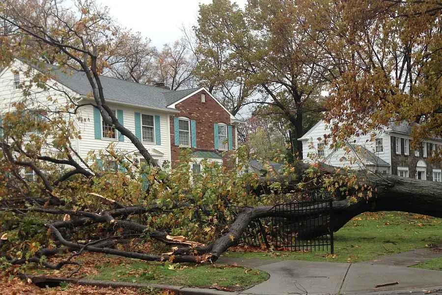 Outside a home with storm damage