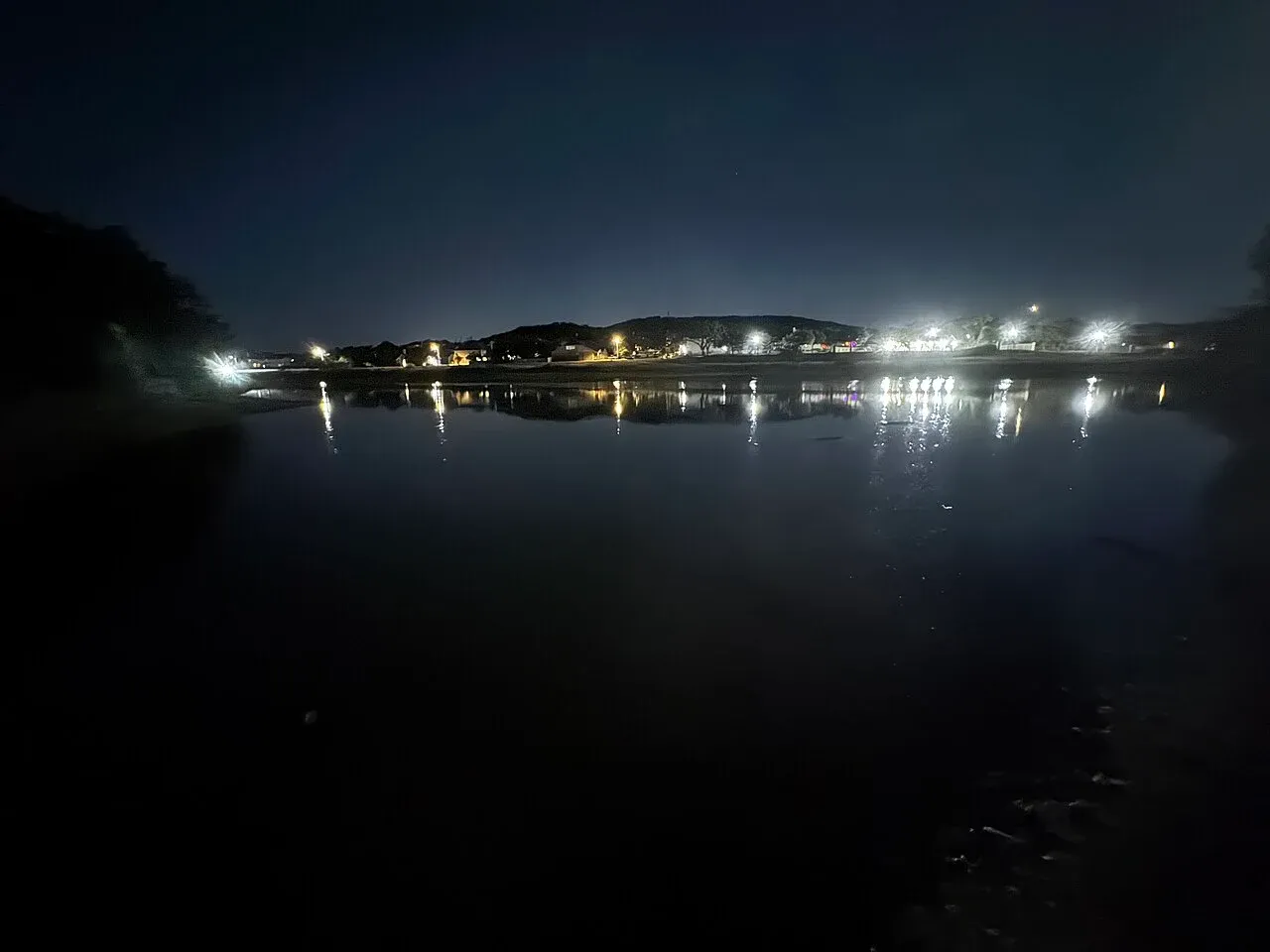 The lake at Timberwood Park, Texas, at night.
