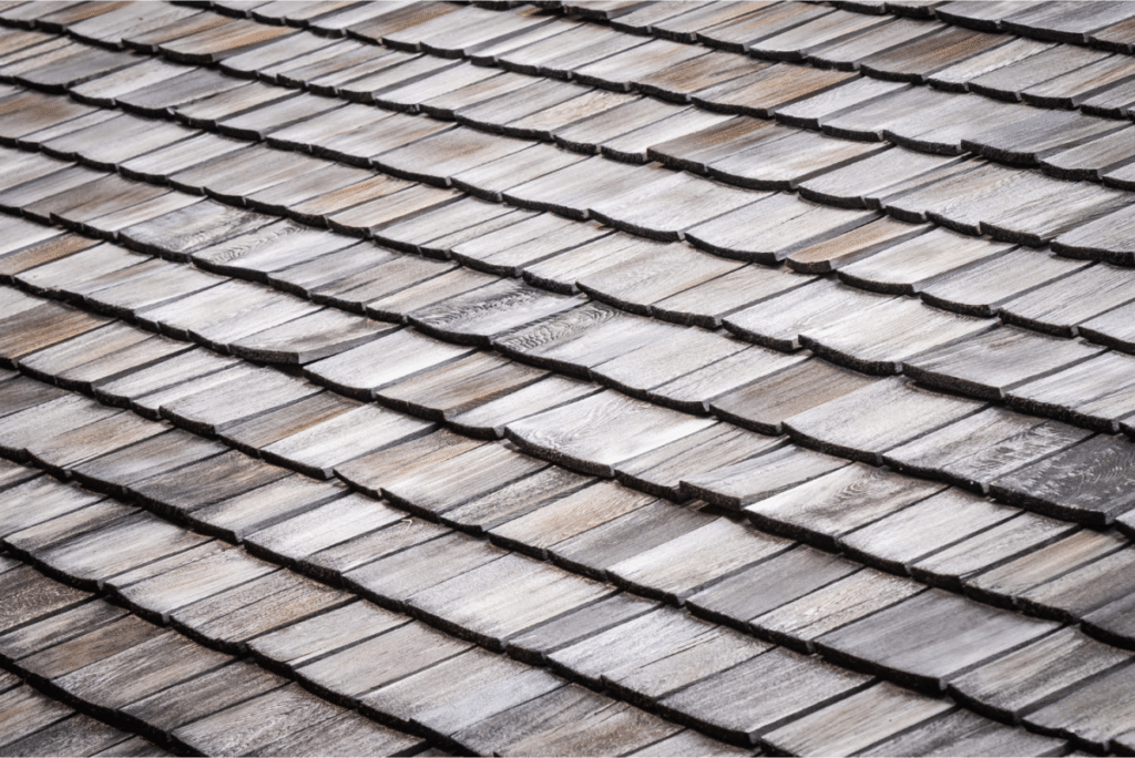 Detailed view of aged wooden roof shingles.