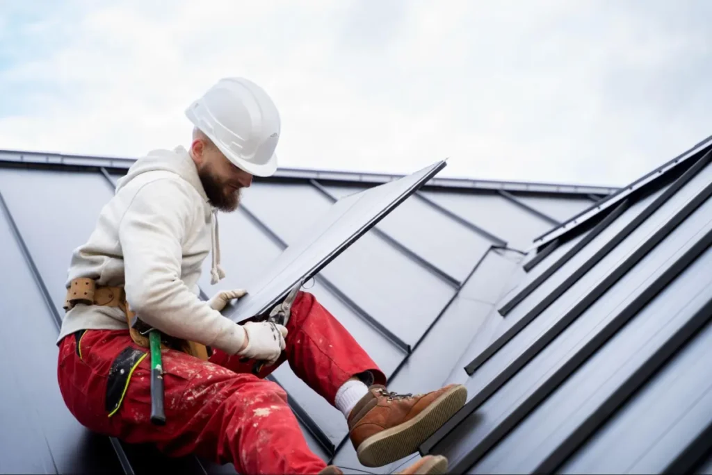 Roof Storm Damage in South Texas: When to Call a Roofer vs. Your Insurance First 4 Contractor installing standing seam roof